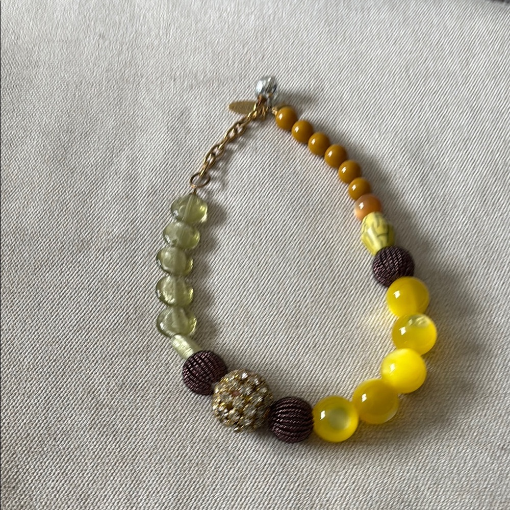 Yellow and Brown Beaded Necklace with Intricate Metal Accent - Picture 2 of 3